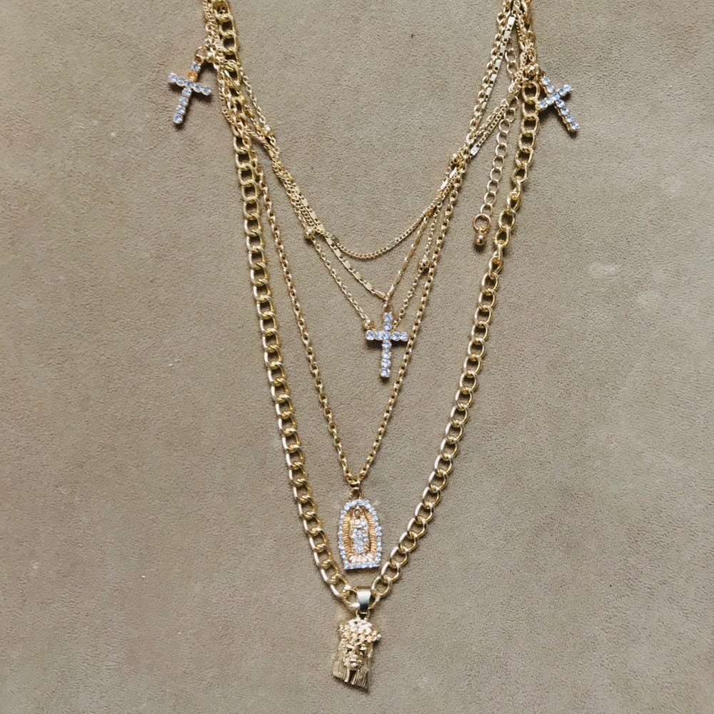2 pairs of earrings and 1 necklace.